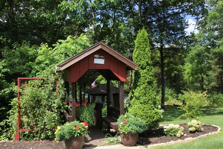 Gazebo and steps to lakeside indoor/outdoor kitchen and deck